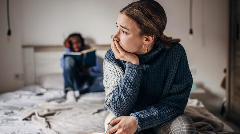 Couple sitting in bed