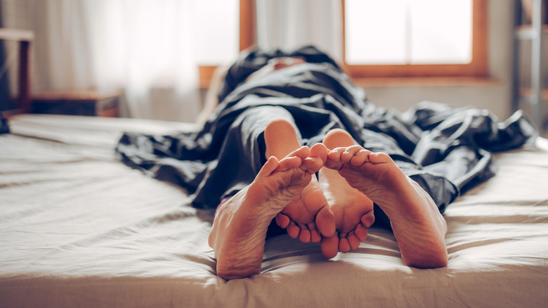 Couple intimate in bed