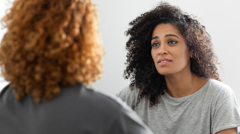 Two women talking