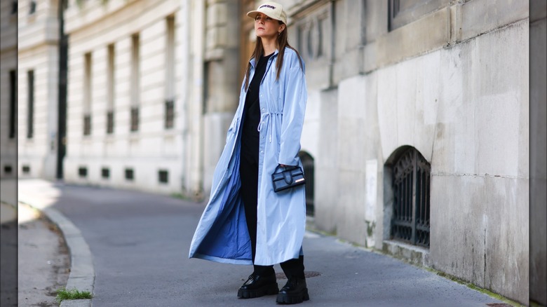 A woman in a blue jacket 