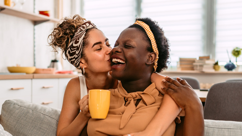 Queer couple embracing