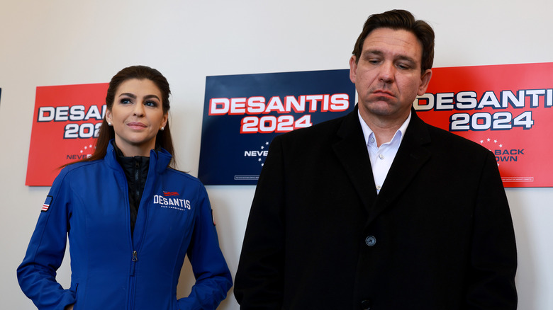 Republican presidential candidate Florida Gov. Ron DeSantis and his wife Casey DeSantis look on during a campaign stop on January 13, 2024