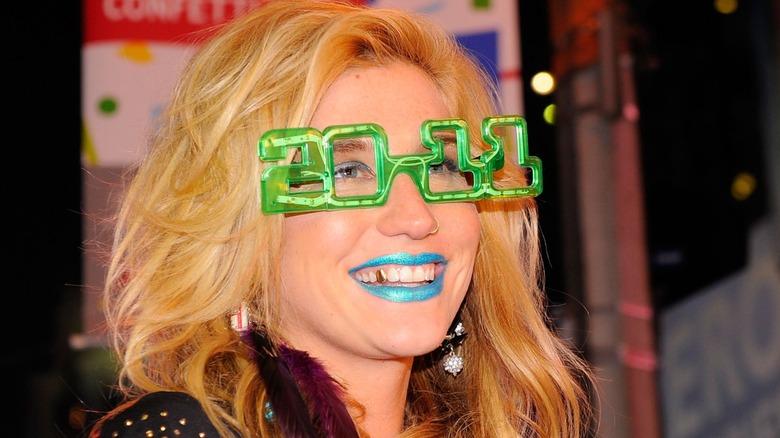 Kesha wearing 2011 glasses on New Year's Eve