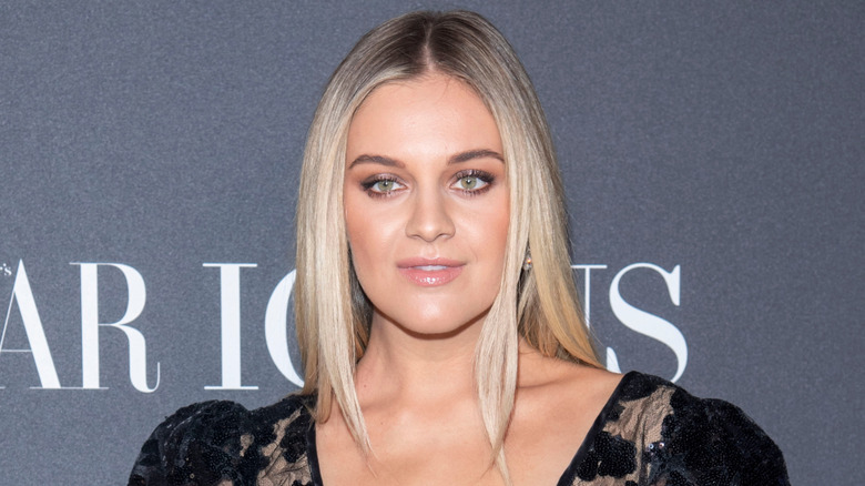 Kelsea Ballerini posing