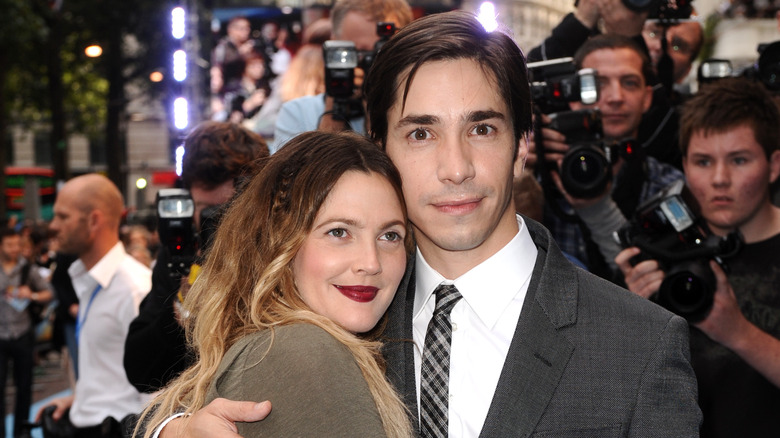 Drew Barrymore hugging Justin Long