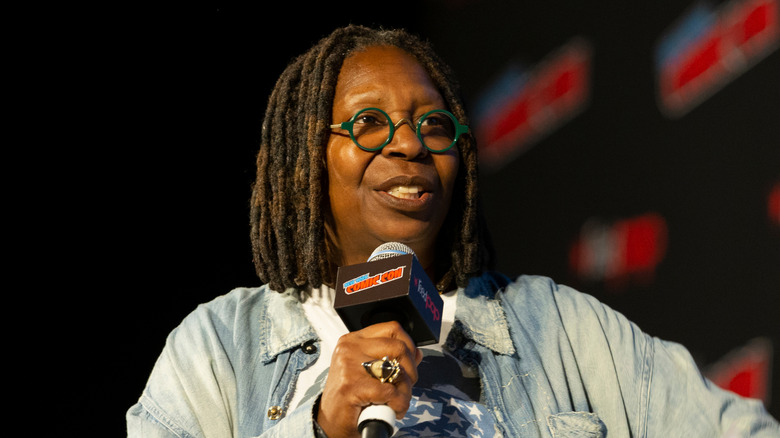 Whoopi Goldberg with microphone