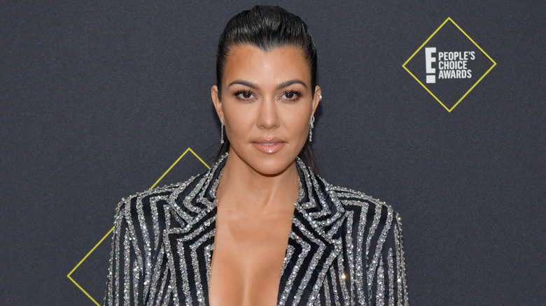 Kourtney Kardashian posing