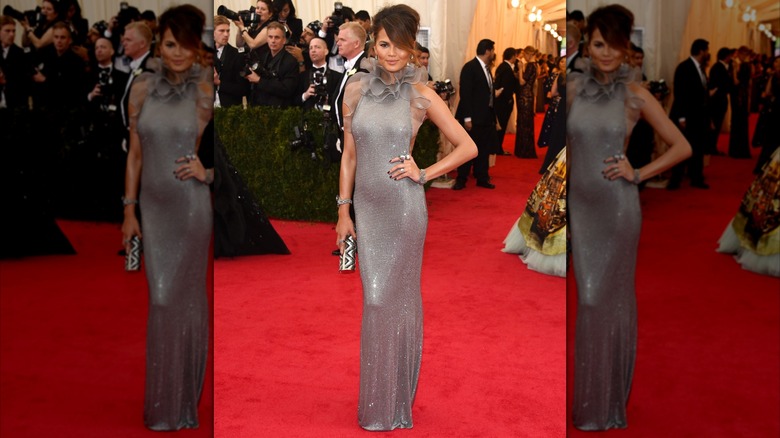 Chrissy Teigen in a silver dress at the 2014 Met Gala