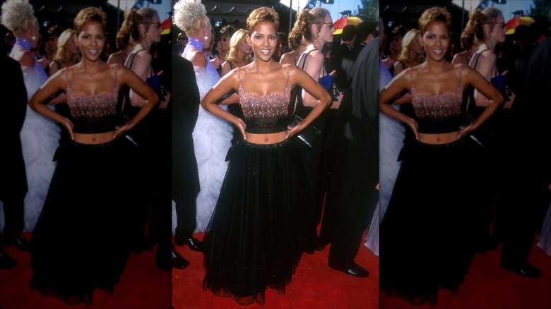 Halle Berry in a crop top and long skirt on the 1999 Emmys red carpet