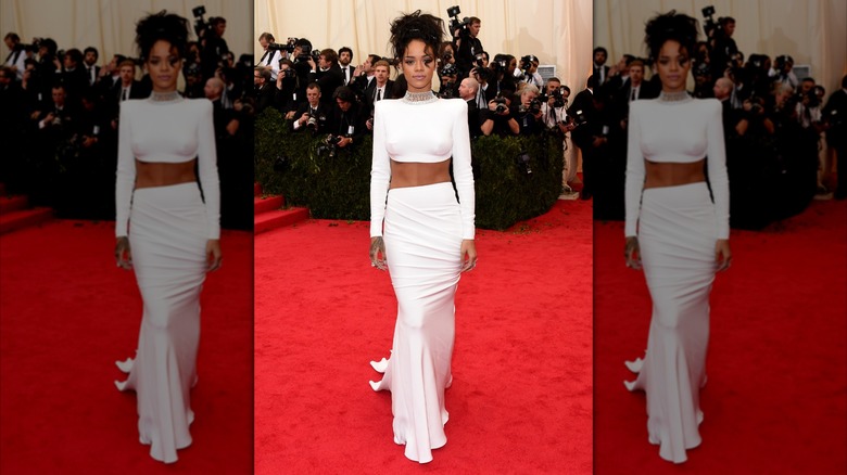 Rihanna in a white crop top and skirt at the 2014 Met Gala