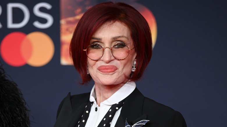 Sharon Osbourne on the red carpet in a suit jacket