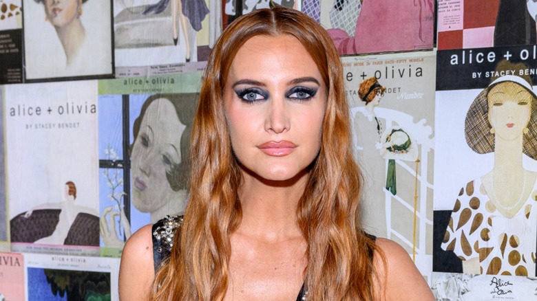 Ashlee Simpson posing for a photo