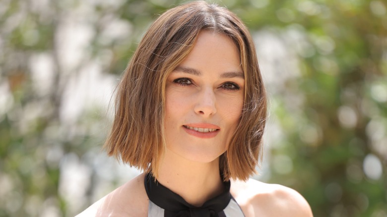 Keira Knightley smiling at an event