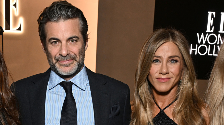 Jim Curtis and Jennifer Aniston attend ELLE's 2025 Women in Hollywood Celebration November 2025 in Los Angeles