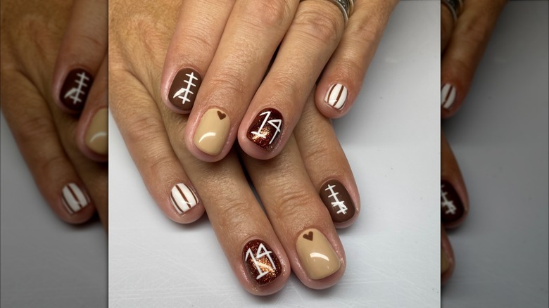 A brown-toned manicure with football details on Instagram