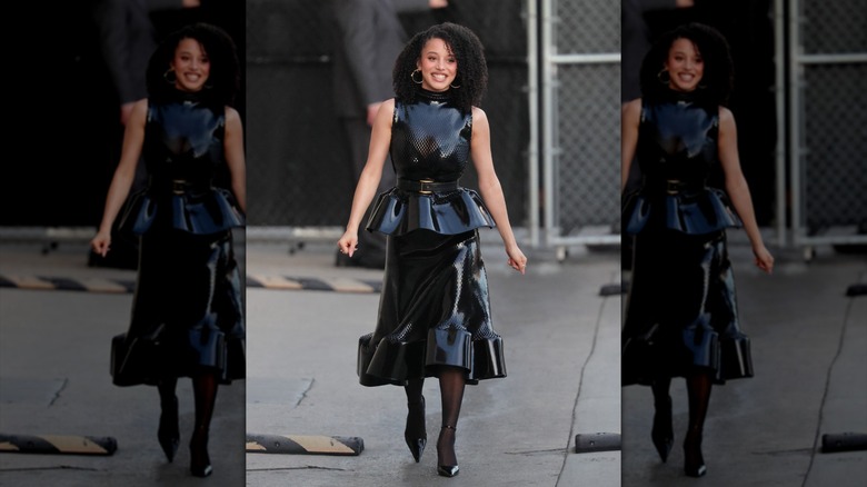 Chase Infiniti smiling while wearing a leather dress ahead of her appearance on "Jimmy Kimmel Live!"