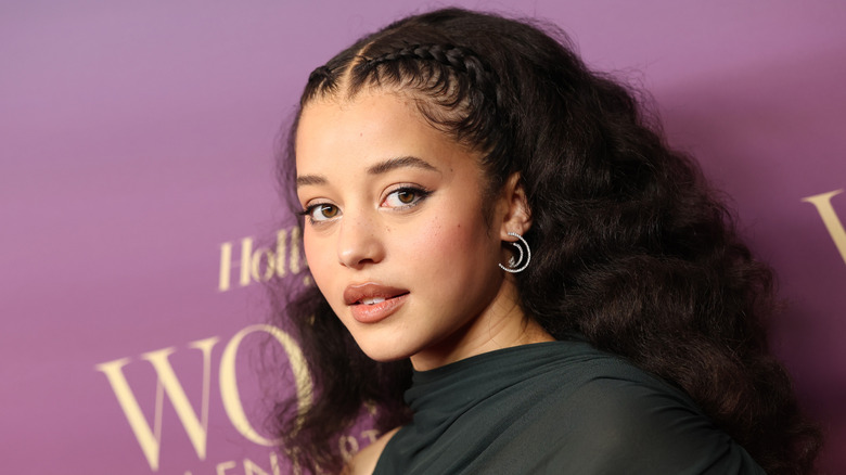 Chase Infiniti with braided hairstyle