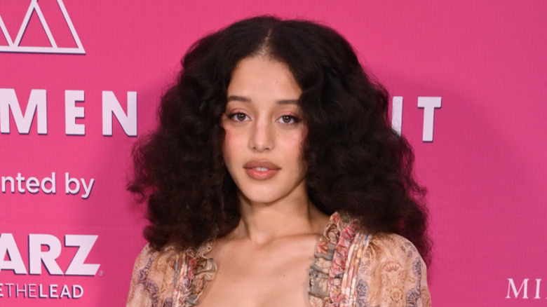 Chase Infiniti in a floral dress