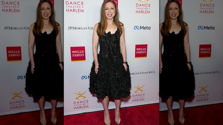Chelsea Clinton in a black dress
