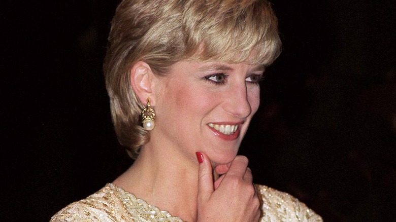 Princess Diana wearing red nail polish