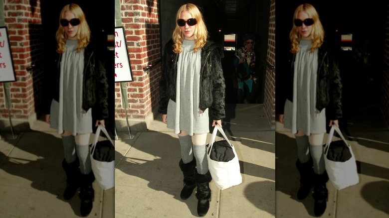 Chloë Sevigny wearing a layered, gray and black look when pictured at the 2003 Sundance Film Festival