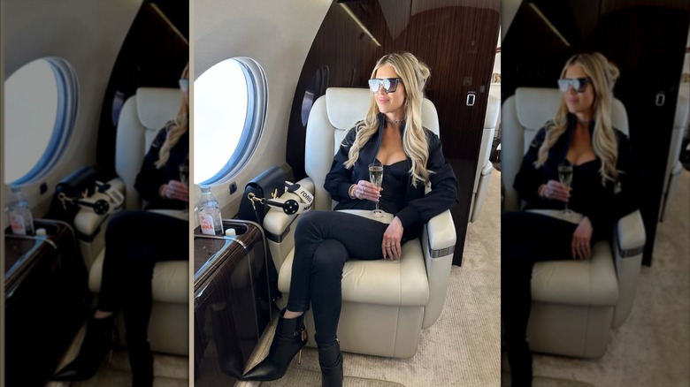 Christina Haack boards private jet