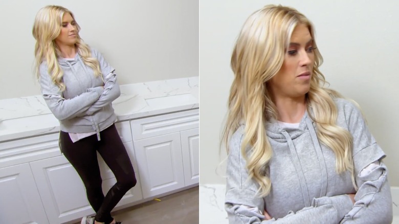 Christina Haack in black leggings and a gray shredded hoodie on an episode of Flip or Flop