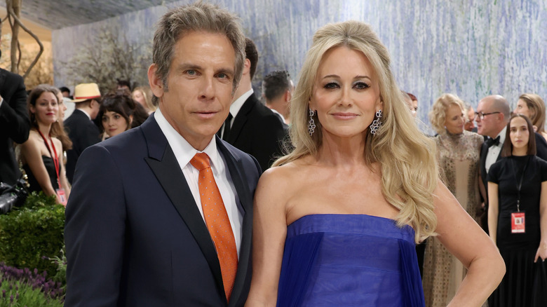 Ben Stiller and Christine Taylor smiling on the red carpet in 2026