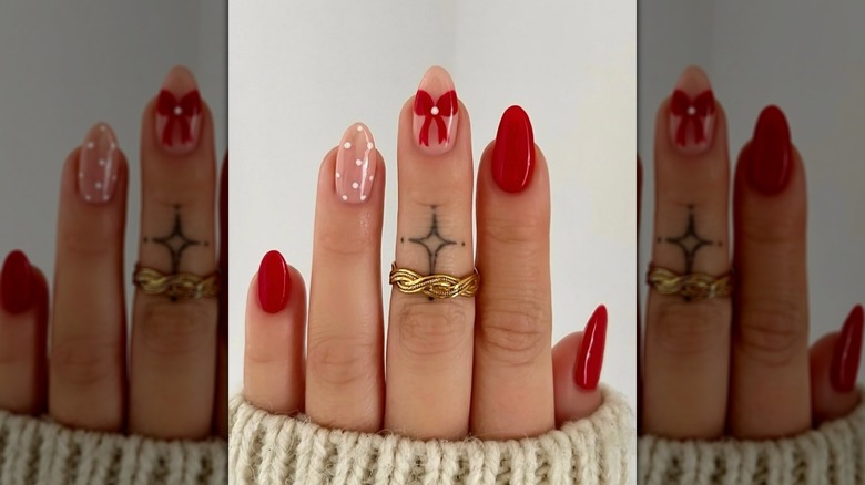 Red christmas themed nails with bows