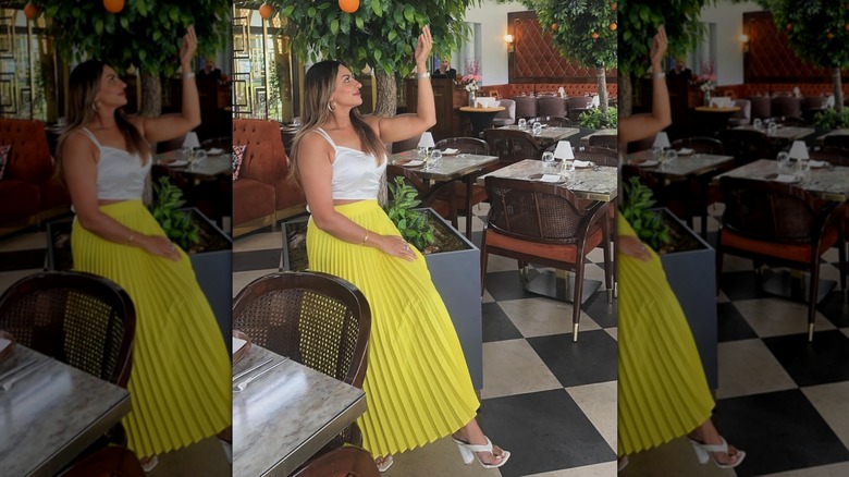 Woman in yellow skirt