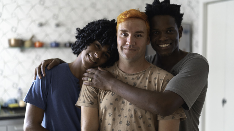 Throuple embracing