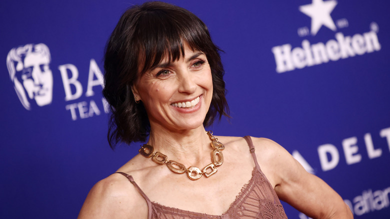 Constance Zimmer smiles on the red carpet in 2026