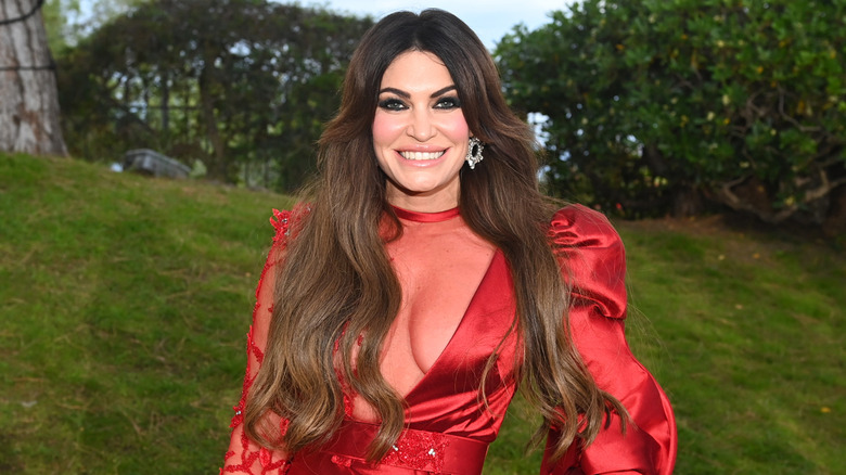 Kimberly Guilfoyle speaking into a microphone