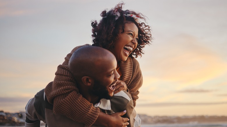 Couple doing a piggyback ride 