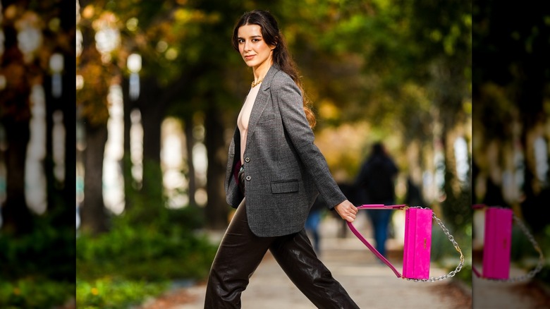 Holding pink bag 