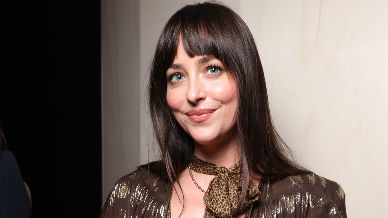 Dakota Johnson soft smiling in 2025