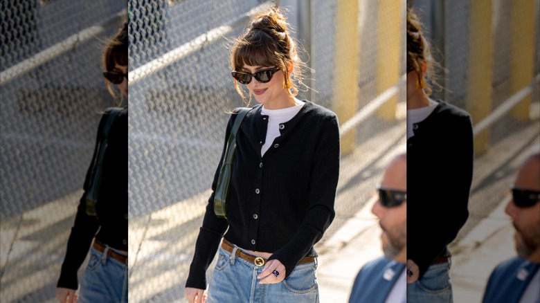 Dakota Johnson in a casual outfit with her hair up