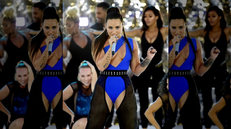 Demi Lovato on stage at the 2017 VMAs