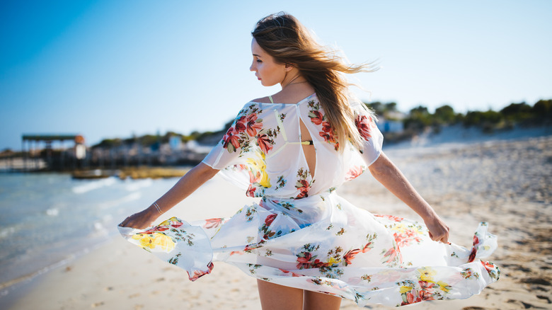 woman on beach in sarong