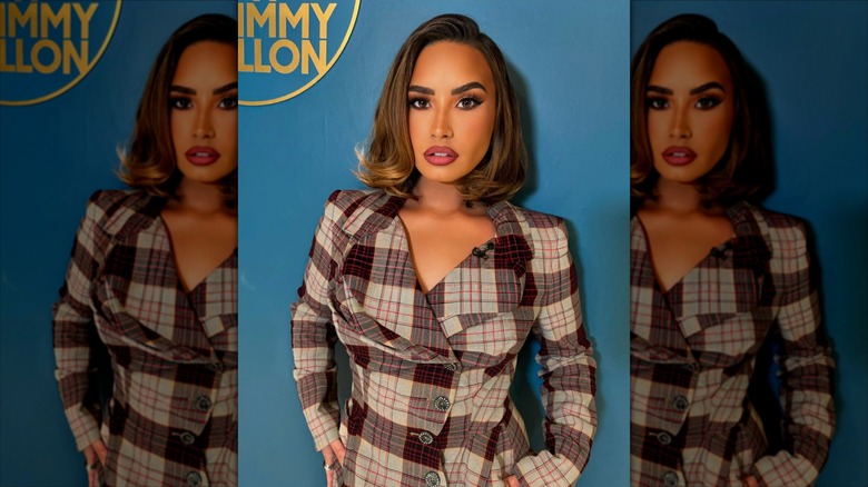 Demi Lovato with a brown, bell-bottom bob