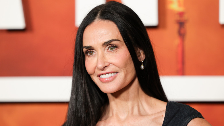 Demi Moore smiles on the red carpet in 2025