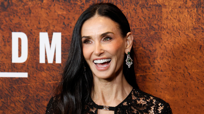 Demi Moore laughs on the red carpet in 2025