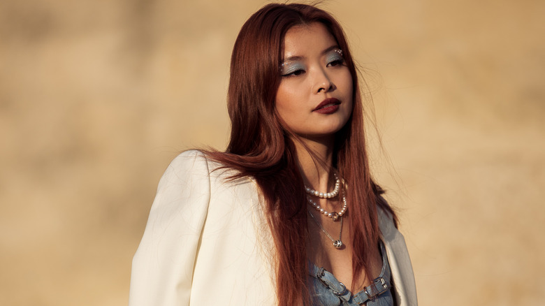 Woman wearing a denim bralette 