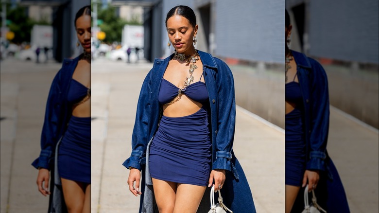 Woman in a denim trench coat 