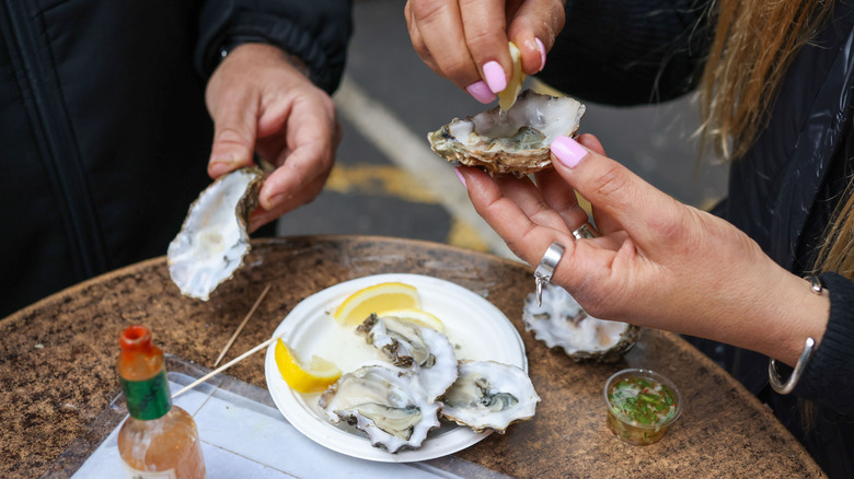 couple eating oysters