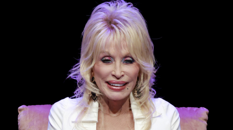 Dolly Parton speaking at an event in 2026