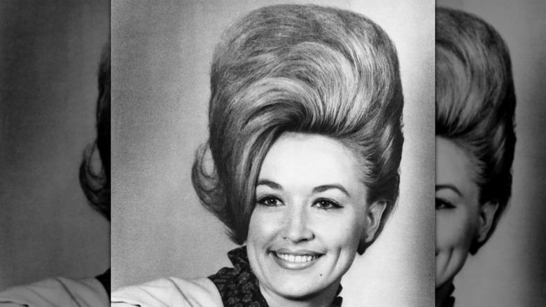 Black-and-white photo showing Dolly Parton with a huge wig in 1965