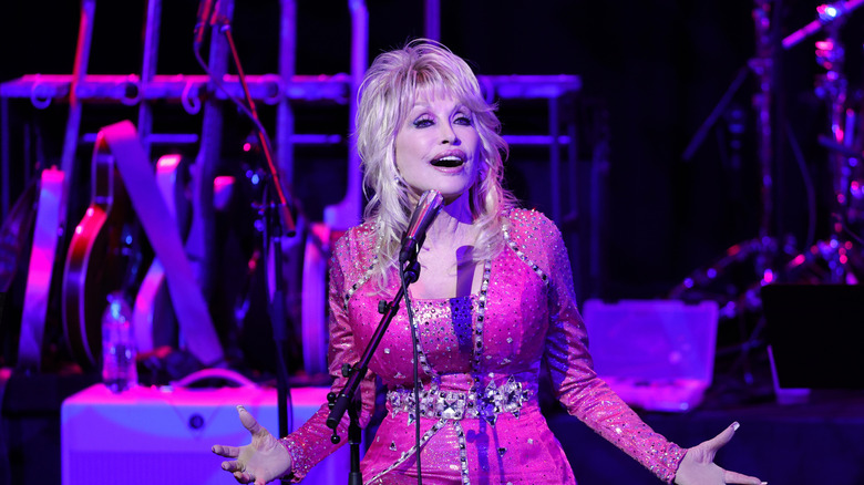 Dolly Parton performs at the 2021 Kiss Breast Cancer Goodbye Concert at CMA Theater at the Country Music Hall of Fame and Museum on October 24, 2021