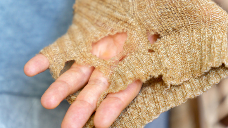 Sweater sleeve with holes