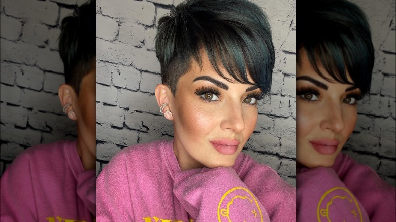 shaved sides and long crown bangs